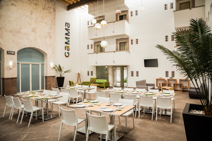 Imagen del bar/restaurante del Hotel Gamma Leon Universidad By Fiesta Inn. Foto 4