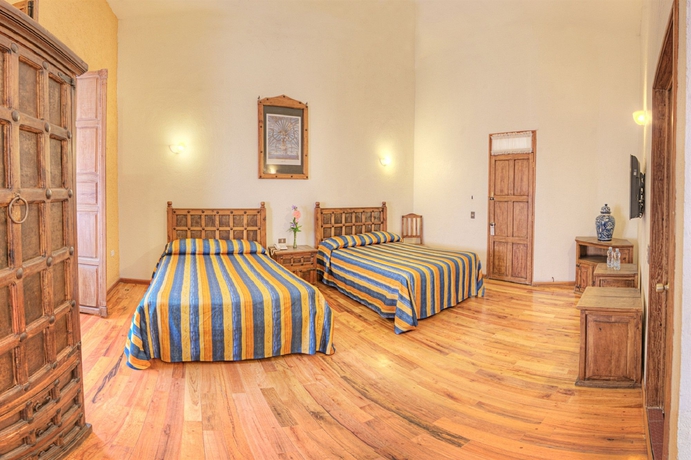 Imagen de la habitación del Hotel Gamma Puebla Se&ntilde;orial Centro. Foto 8