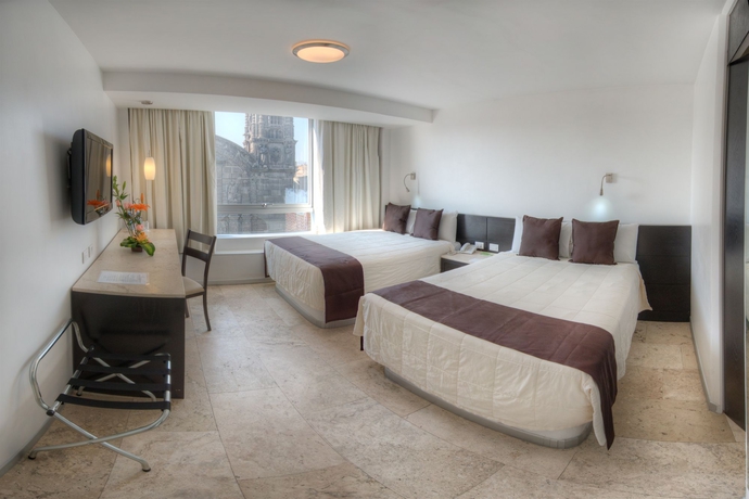 Imagen de la habitación del Hotel Gamma Puebla Se&ntilde;orial Centro. Foto 9