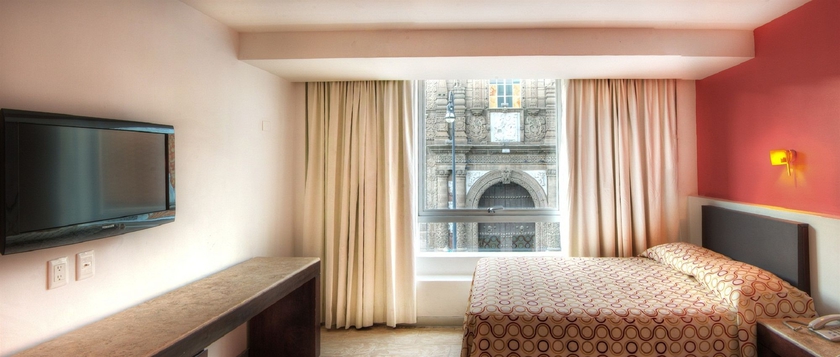 Imagen de la habitación del Hotel Gamma Puebla Se&ntilde;orial Centro. Foto 11