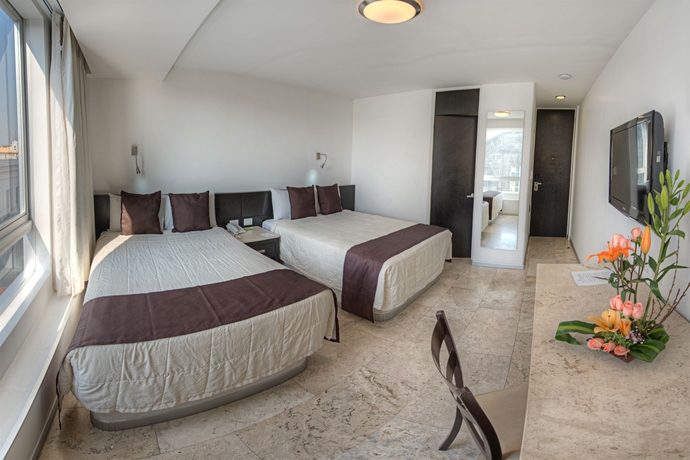 Imagen de la habitación del Hotel Gamma Puebla Se&ntilde;orial Centro. Foto 12