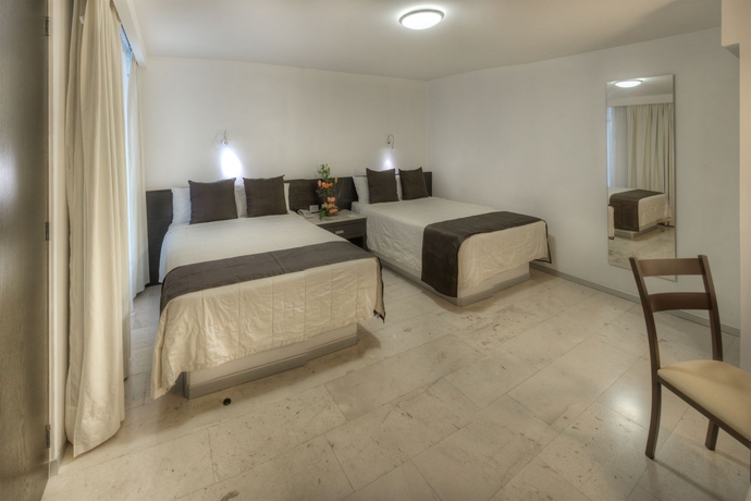 Imagen de la habitación del Hotel Gamma Puebla Se&ntilde;orial Centro. Foto 13