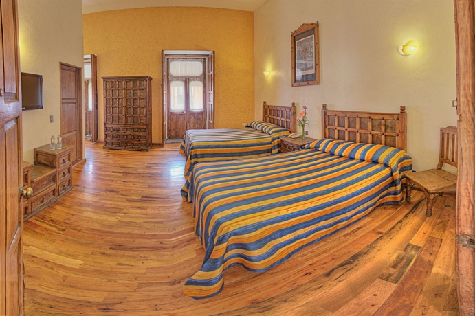 Imagen de la habitación del Hotel Gamma Puebla Se&ntilde;orial Centro. Foto 14