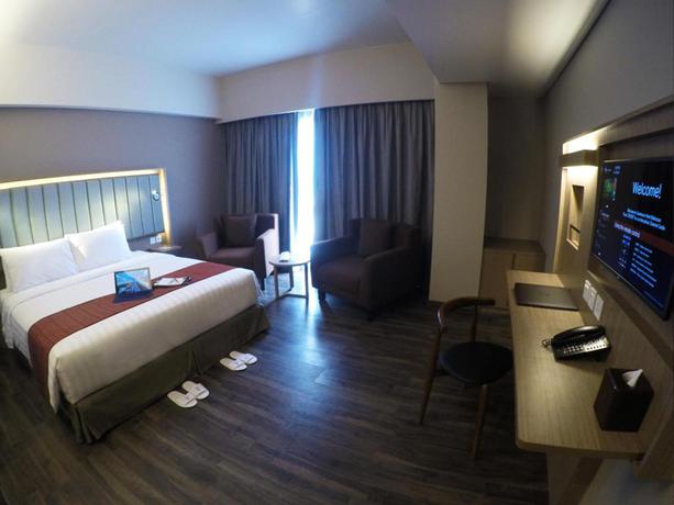 Imagen de la habitación del Hotel Gammara Makassar. Foto 4