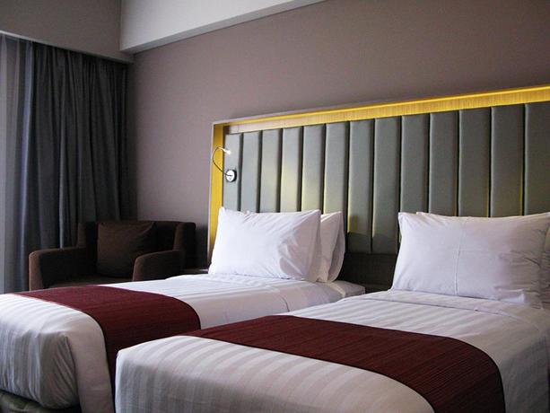 Imagen de la habitación del Hotel Gammara Makassar. Foto 5