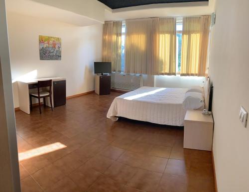 Imagen de la habitación del Hotel G&D Mi.Ma Condhotel. Foto 4