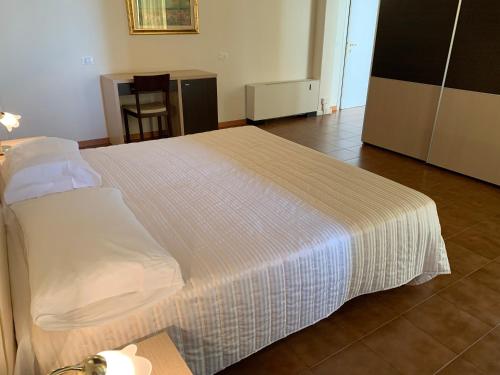 Imagen de la habitación del Hotel G&D Mi.Ma Condhotel. Foto 5