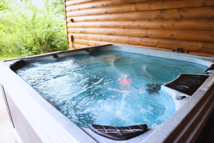 Imagen de la habitación del Hotel Gandalf s Getaway Indoor Pool Theater Arcade Firepit Book Now. Foto 3