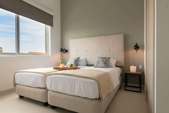 Imagen de la habitación del Hotel Ganem Lifestyle Suites. Foto 11