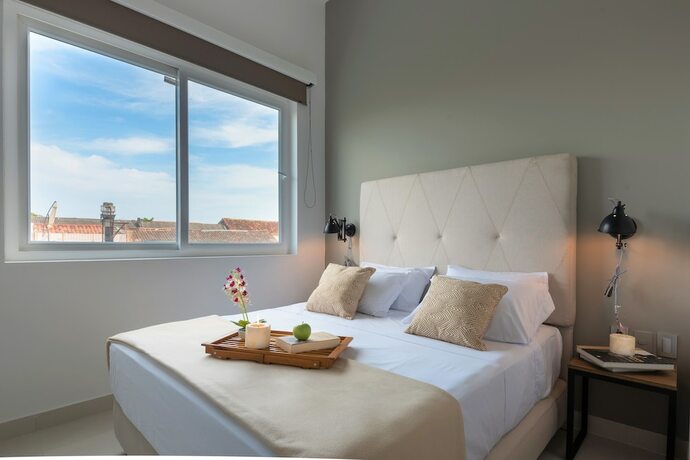 Imagen de la habitación del Hotel Ganem Lifestyle Suites. Foto 17