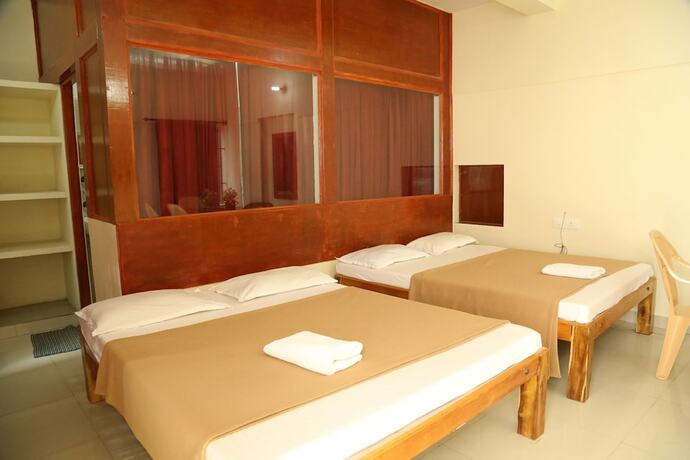 Imagen de la habitación del Hotel Ganesh Beach Resort. Foto 14