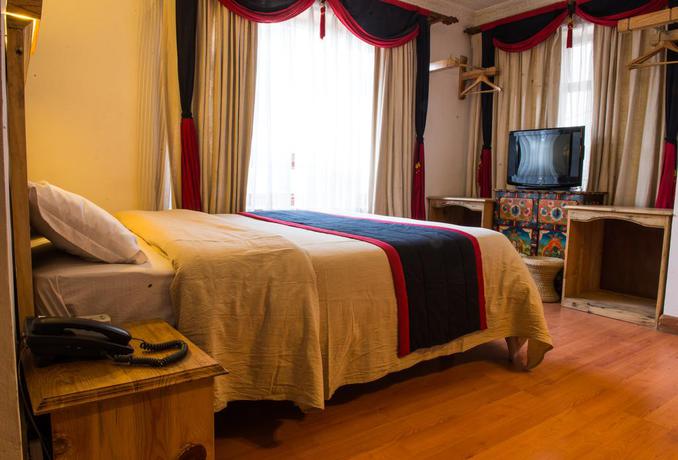 Imagen de la habitación del Hotel Ganesh Himal. Foto 3