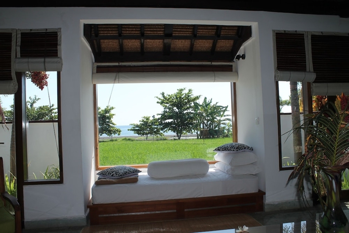 Imagen de la habitación del Hotel Ganesha Bali Coral Reef Villas. Foto 4