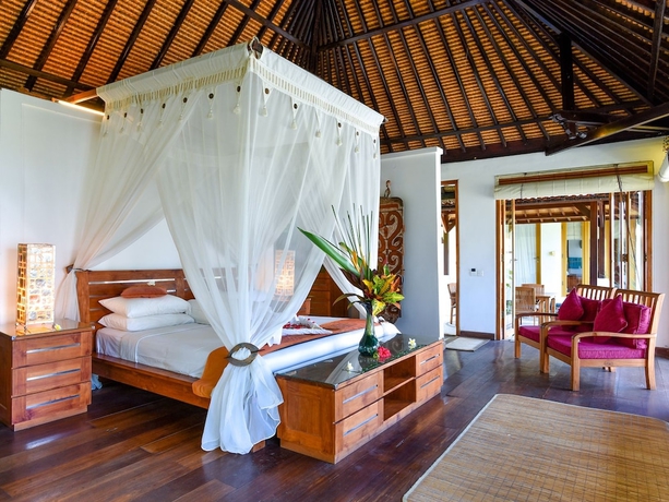 Imagen de la habitación del Hotel Ganesha Bali Coral Reef Villas. Foto 9