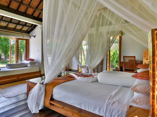 Imagen de la habitación del Hotel Ganesha Bali Coral Reef Villas. Foto 12