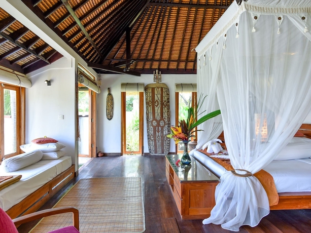 Imagen de la habitación del Hotel Ganesha Bali Coral Reef Villas. Foto 13