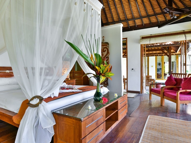 Imagen de la habitación del Hotel Ganesha Bali Coral Reef Villas. Foto 14