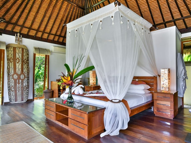 Imagen de la habitación del Hotel Ganesha Bali Coral Reef Villas. Foto 15