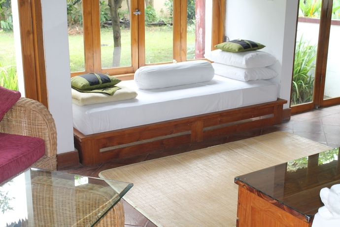 Imagen de la habitación del Hotel Ganesha Bali Coral Reef Villas. Foto 16