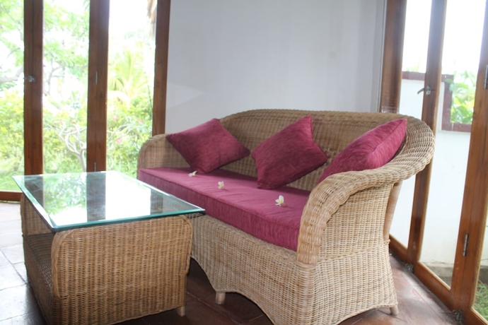 Imagen de la habitación del Hotel Ganesha Bali Coral Reef Villas. Foto 17