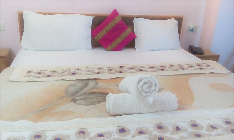 Imagen de la habitación del Hotel Ganesha Inn Ganga View. Foto 3