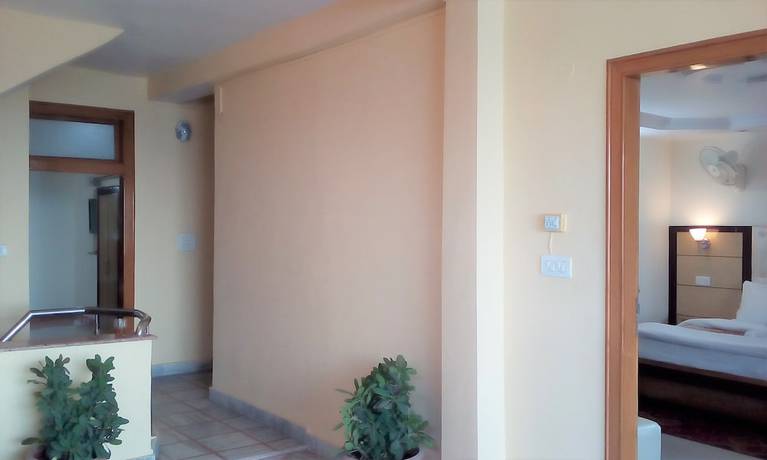 Imagen de la habitación del Hotel Ganesha Inn Ganga View. Foto 4