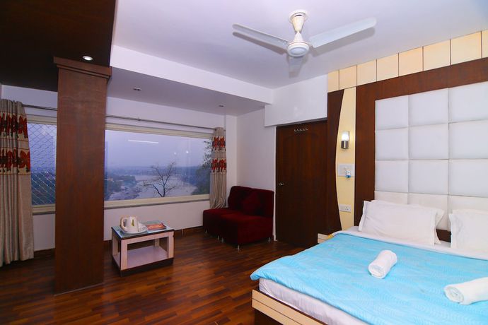 Imagen de la habitación del Hotel Ganesha Inn Ganga View. Foto 6