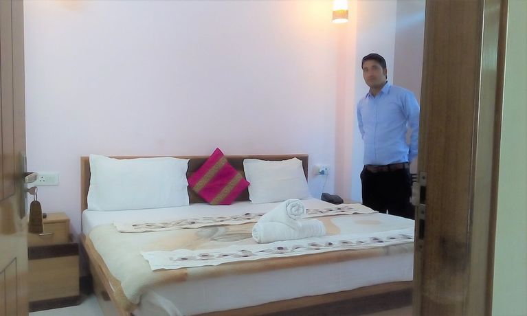 Imagen de la habitación del Hotel Ganesha Inn Ganga View. Foto 8