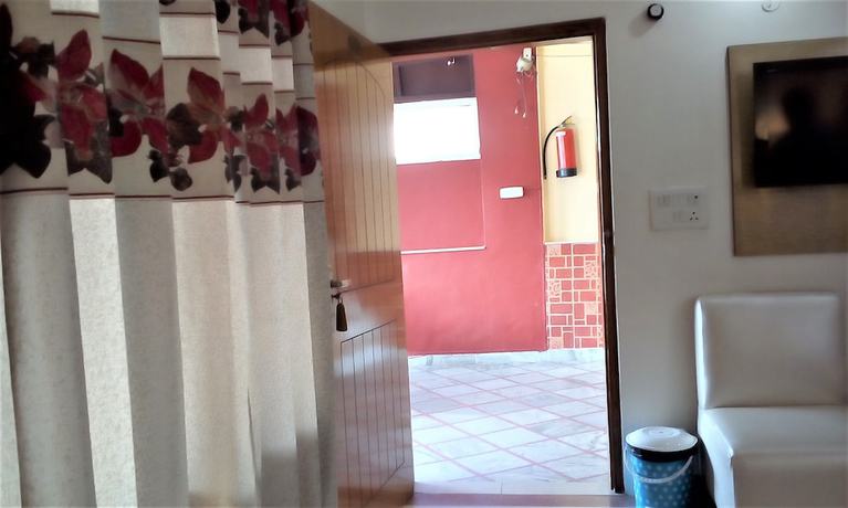 Imagen de la habitación del Hotel Ganesha Inn Ganga View. Foto 13