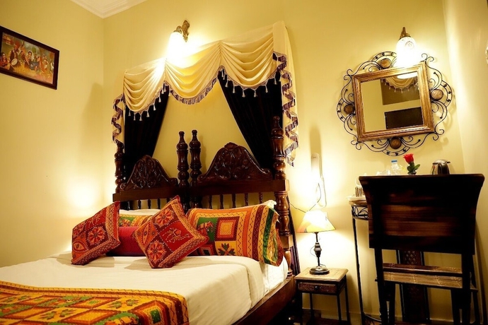 Imagen de la habitación del Hotel Ganesha Palace. Foto 15