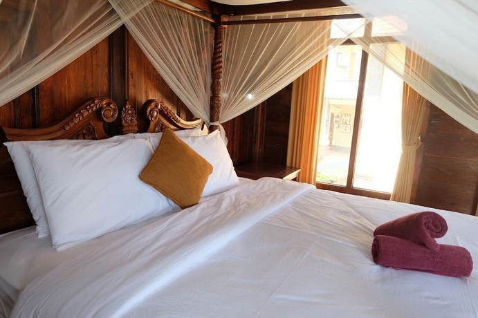 Imagen de la habitación del Hotel Ganesha Ubud Inn. Foto 9