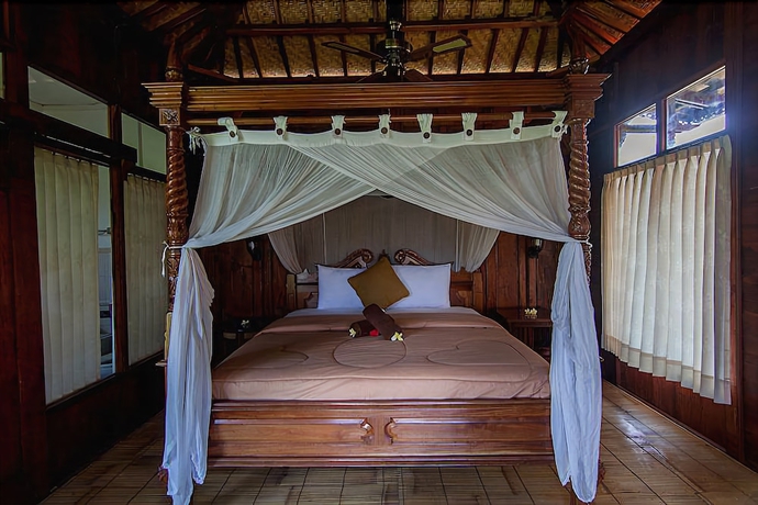 Imagen de la habitación del Hotel Ganesha Ubud Inn. Foto 10