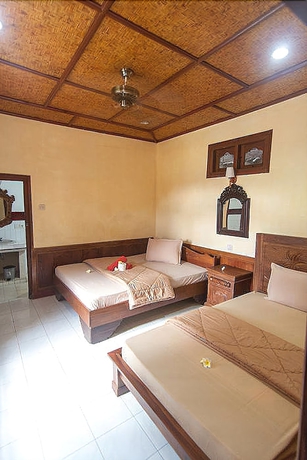 Imagen de la habitación del Hotel Ganesha Ubud Inn. Foto 11
