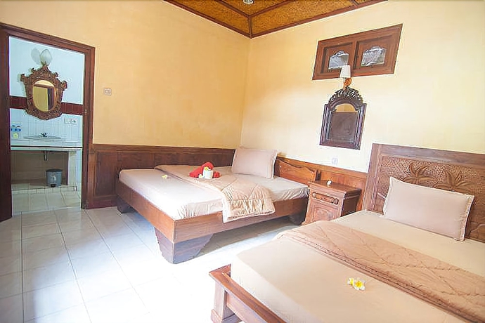 Imagen de la habitación del Hotel Ganesha Ubud Inn. Foto 13