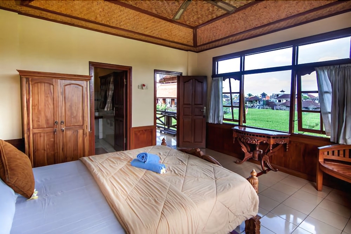 Imagen de la habitación del Hotel Ganesha Ubud Inn. Foto 16