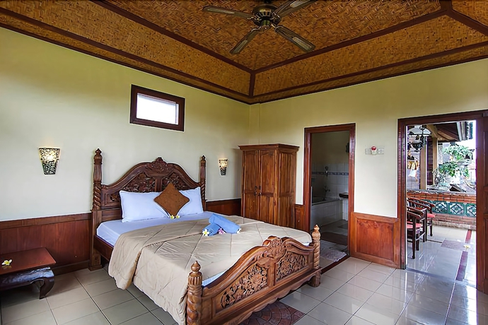 Imagen de la habitación del Hotel Ganesha Ubud Inn. Foto 18