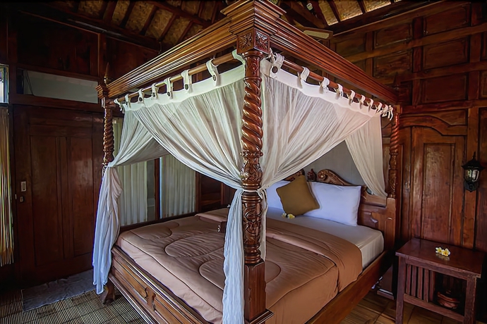 Imagen de la habitación del Hotel Ganesha Ubud Inn. Foto 19