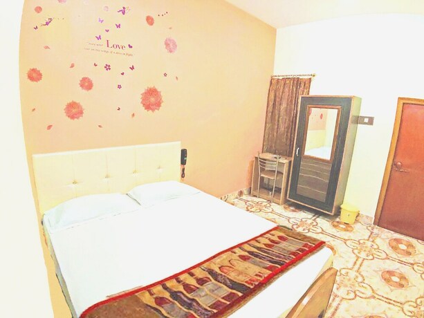 Imagen de la habitación del Hotel Ganesha, Varanasi. Foto 25