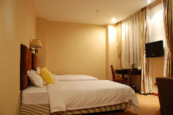 Imagen de la habitación del Hotel GangWan Business. Foto 7