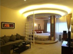 Imagen de la habitación del Hotel GangWan Business. Foto 11