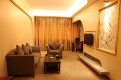 Imagen de la habitación del Hotel GangWan Business. Foto 13