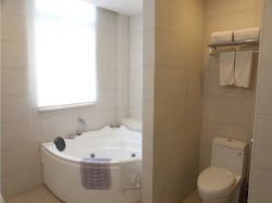 Imagen de la habitación del Hotel GangWan Business. Foto 18