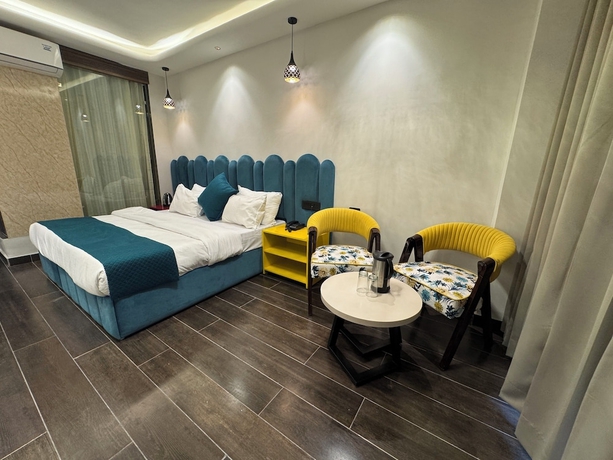Imagen de la habitación del Hotel Ganga Aamantran. Foto 2