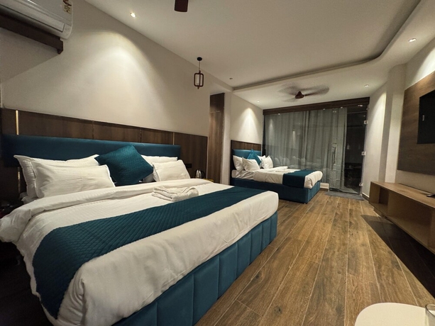 Imagen de la habitación del Hotel Ganga Aamantran. Foto 4