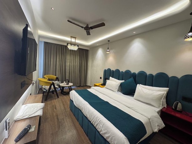 Imagen de la habitación del Hotel Ganga Aamantran. Foto 7