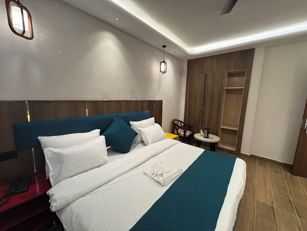 Imagen de la habitación del Hotel Ganga Aamantran. Foto 8