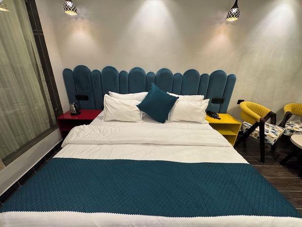 Imagen de la habitación del Hotel Ganga Aamantran. Foto 9