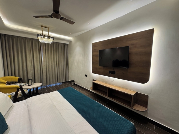 Imagen de la habitación del Hotel Ganga Aamantran. Foto 10