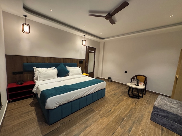 Imagen de la habitación del Hotel Ganga Aamantran. Foto 11