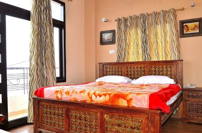 Imagen de la habitación del Hotel Ganga Monastery. Foto 22